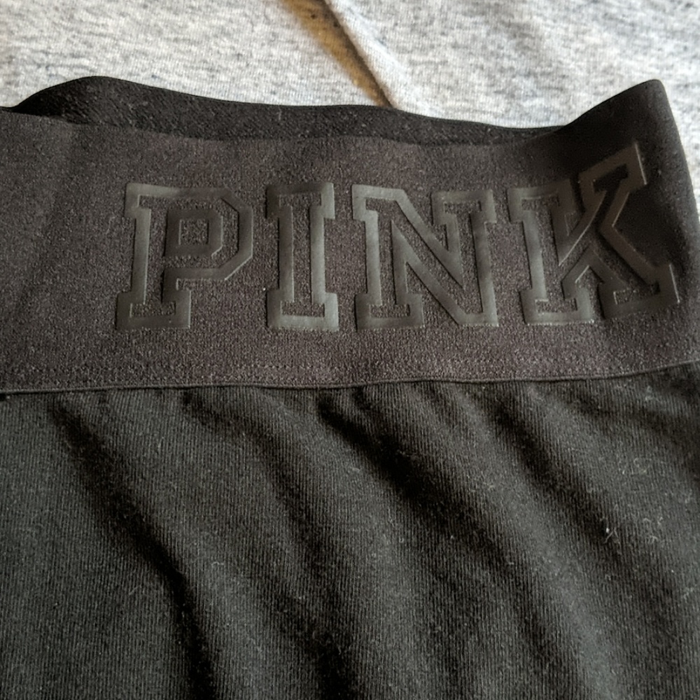 Pink 3/4 length leggings, mesh cut outs on inside